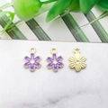 Detailed view of purple flower charms with gold edges for DIY jewelry making - 8x11mm / Purple