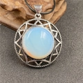 Zilveren hexagram ketting met blauwe maansteen hanger aan een zwart koord - Opaal (Synthetisch)