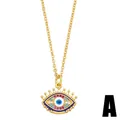 Golden Evil Eye necklace pendant with colorful crystals and blue enamel accents - Long Eyelash Style