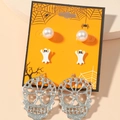 Detail view of Halloween earring set with ghost, pearl, and glitter skull designs - Ghost Skull Pearl Set 3 Pairs