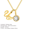 Gold plated stainless steel necklace with heart letter pendant and round clear birthstone - Letter U / Gold