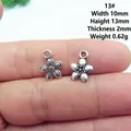 Detail view of 10mm antique silver alloy flower charms with exact dimensions and weight - 13# Five Petal Flower