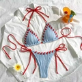 Blue ribbed bikini set with red tie details on a stylish summer vacation background - S / Blue