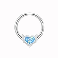 Detalle de un aro de nariz plateado con una piedra de opalo azul en forma de corazón - Estilo Ópalo Corazón Azul (NN3121503)