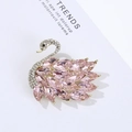 Elegant swan brooch with pink crystal feathers and pavé rhinestones on gold base - Pink Swan