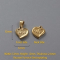 Macro view of 12mm 18k gold heart pendant with LOVE engraving on both sides - P00022G-LOVE Embossed Heart