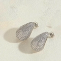 Macro shot of silver teardrop stud earrings with pave-set cubic zirconia and butterfly back - Silver White Zirconia Teardrop Stud
