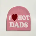 Detail of pink knitted beanie featuring red heart and I HOT DADS jacquard pattern - Dads Style / Pink