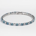 Macro detail of silver evil eye tennis bracelet with blue beads and cubic zirconia - Light Blue White Gold