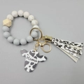 Silicone bead keychain bracelet with cow print tassel and Mama wooden bull head pendant - White