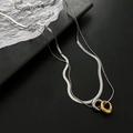Double-layer silver snake chain necklace with interlocking gold and silver rings - Double Ring Snake Chain / Silver