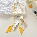 Silk-textured long hair ribbon with mustard yellow border and blue H-pattern print - Ginger Border H