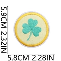 Macro shot of embroidered shamrock patch with size markings for bags and clothing - No.11/Round Shamrock