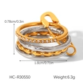 Detail view of four-piece mixed-metal rings showing product size and weight specifications - Safety Pin Layered Style (HC-R30550)