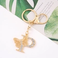 Detail of crystal-encrusted letter P keychain with butterfly and gold-plated clasp - Letter P