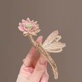 Detailed view of dragonfly and lotus hair claw with pink enamel and white pearls - L102 Dragonfly Lotus