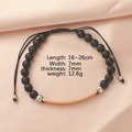 Detail of black matte bead bracelet with adjustable cord and rose gold curved metal bar - Black Agate + Rose Gold Plate