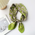 Elegant emerald green silk scarf with beige paisley pattern in a stylish knot - Green Sun Butterfly Paisley