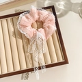 Pink floral scrunchie with white lace edges and long ribbons on velvet tray - Pink Ribbon Lace