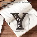 Rustic cast iron letter Y wall decor with vintage texture and mounting screws - Letter Y
