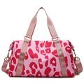 Pink leopard print travel bag in water-resistant Oxford fabric with gold hardware - Pink