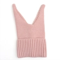 Detailed knit texture of a pink winter hat with long ears and warm ribbed fabric - Pink