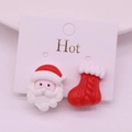 Detail of Christmas-themed clip-on earrings featuring Santa Claus and red stocking motifs - 18# Asymmetric Santa & Sock Bag / Clip-on Earrings Pair