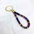 Ethnic bohemian woven wristlet keychain with gold metal ring on white background - No.6/Yellow Red Wave