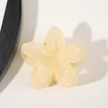Macro view of creamy yellow flower hair claw clip with glossy five-petal floral design - Jelly Milky Yellow