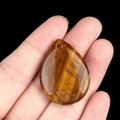 Teardrop tiger eye stone pendant with golden brown cat eye effect and polished finish - Tiger's Eye