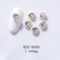 Macro shot of 7.5x8mm heart-shaped aurora gems with pearl trim for 3D nail art design - Pink Heart (8600 Pink Green)