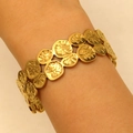 Golden wide cuff bracelet with double-row embossed circular plates in a vintage style - Double Row Disc Sunburst (X615)