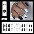 Detail of medium almond press-on nails with black French tips and silver glitter gradient - Black White Glitter (W500)