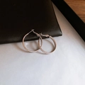 Detailed view of silver hoop earrings with a matte texture and zircon heart accents - 30mm Silver Frosted Process Style (119#)