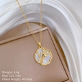 Detailed view of woodpecker pendant with white shell and crystals on gold chain - Magpie Branch Style (A327)