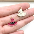 Pink and black enamel witch hat pendant held on a finger to show detailed size - Purple Wizard Hat