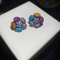Macro view of flower stud earrings with multi-colored cubic zirconia and black gold finish - Silver Earring Post - Colorful