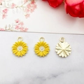 Three sunflower alloy pendants with yellow enamel and golden finish on marble - 13x16mm / Yellow