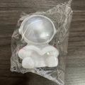 White astronaut-shaped portable night light for kids in clear plastic packaging - Small Astronaut Silver Book
