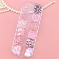 Pink butterfly and flower resin nail art charms in a 12-slot clear storage box - Pink Aurora Mixed Ornaments Style (T-340)