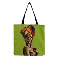 Close-up of green canvas tote bag featuring an African art female portrait print - Green Style-Afro Lady Portrait-Art Style