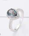 Elegant silver ring featuring pear-cut multicolor zircon with halo diamond accents - Ur0582b