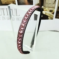 Baroque pink crystal rhinestone headband with black fabric base and elegant side view - Pink Rhinestone