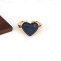 Close-up of gold adjustable ring with a heart-shaped blue pavé cubic zirconia inlay - Adjustable Open / Dark Blue