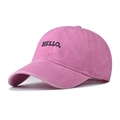 Close-up of HELLO black letter embroidery on vintage washed pink baseball cap - Pink