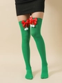 Christmas green thigh high socks featuring a red satin bow and white plush pom poms - Green Socks with Red Bow and White Pompoms