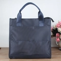 Bolso tote azul marino con diseño de múltiples bolsillos y acabado en tela oxford - Azul