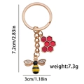 Golden honeycomb and crystal bee keychain charm with size specs 7.2cm and 7.3g weight - Red Honeycomb Bee