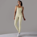 Detail showing seamless ribbed knit texture of slim fit light green yoga bodysuit - Oatmeal