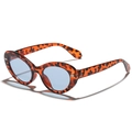 Retro oval tortoiseshell sunglasses with light blue lenses and vintage cat-eye frames - Tortoise Frame Blue Lens